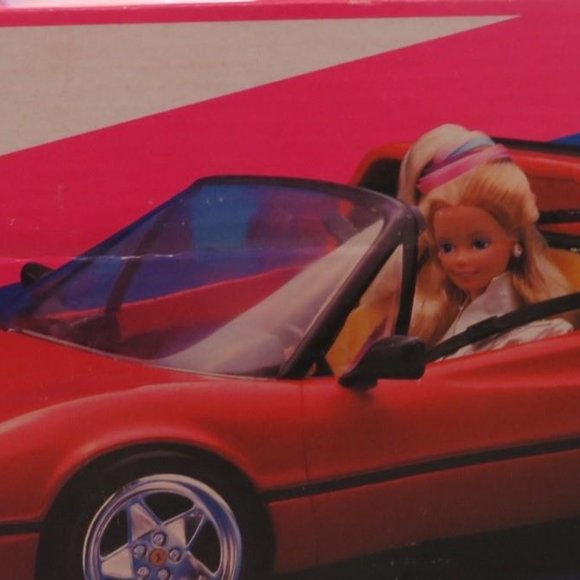 Barbie doll Red Ferrari car